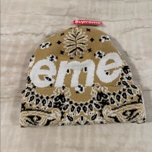 NWT Supreme winter hat. Tan bandana. Purchased in London